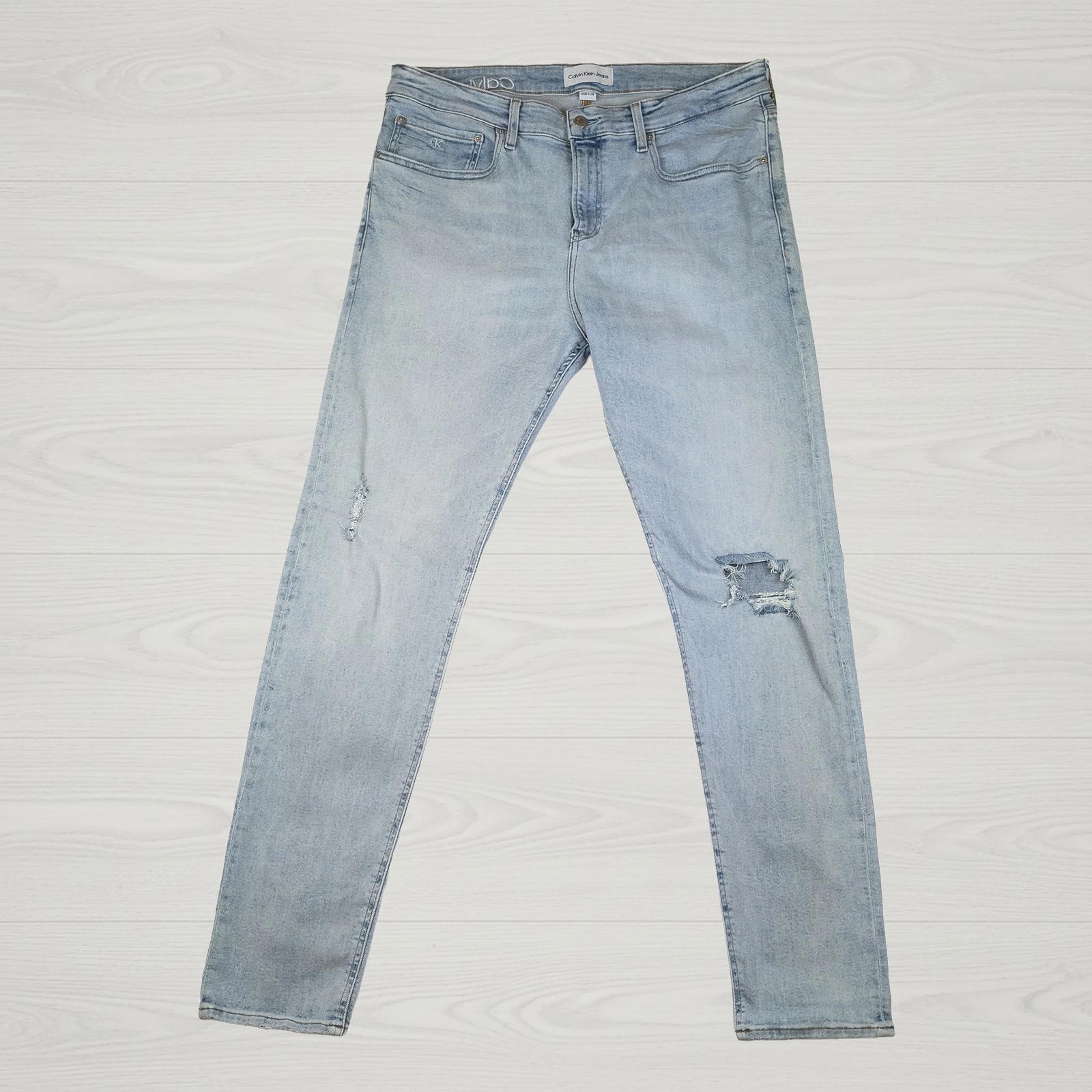 Calvin Klein Jeans Men's W38 L34 Light Blue Ripped Skinny Slim Stretch Denim by Calvin Klein – | RewearableUK