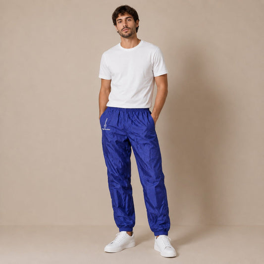 Vintage Sergio Tacchini Men's Track Pants W34 Royal Blue – Trousers product photo 1 | RewearableUK